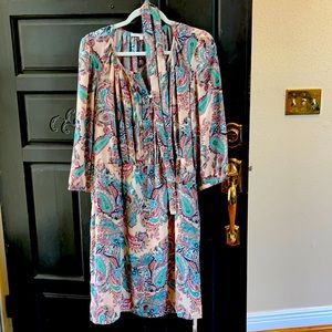 Floral dress with waist tie.